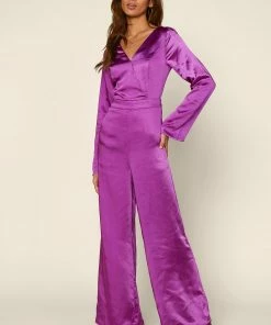 SKIES ARE BLUE Flared Long Sleeve Jumpsuit