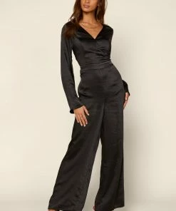 SKIES ARE BLUE Flared Long Sleeve Jumpsuit
